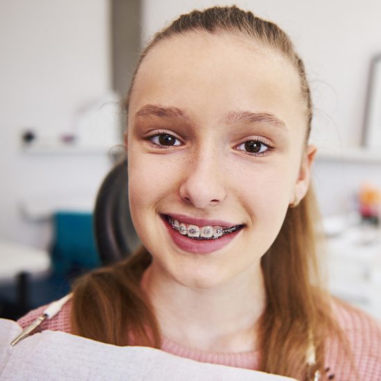 Smiling teen girl with braces