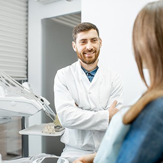 a patient chatting with her orthodontist