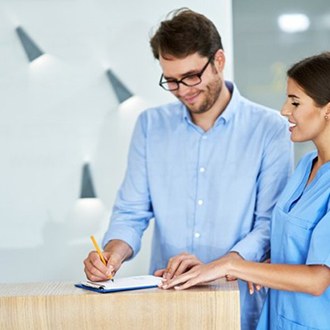 a patient paying their bill