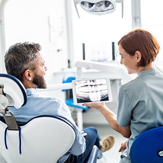 Grafton orthodontist showing patient X-rays